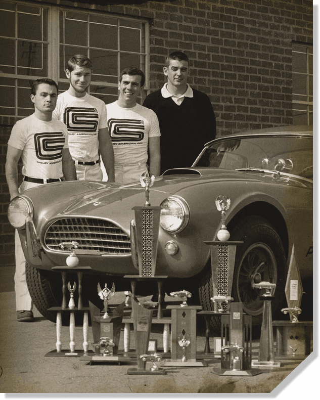 Shelby American team with Cobra and trophies